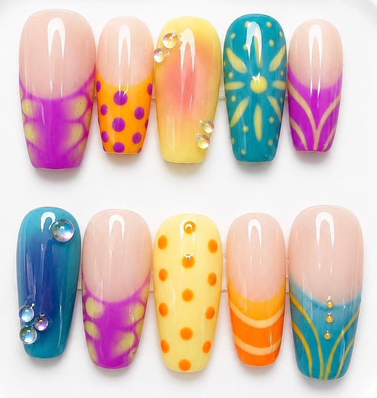 May handcrafted press-on nails in purple, yellow, orange & blue | Eleanor May Collective